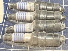 Pkg of 4 Johnson Evinrude OMC 500457 Spark Plugs